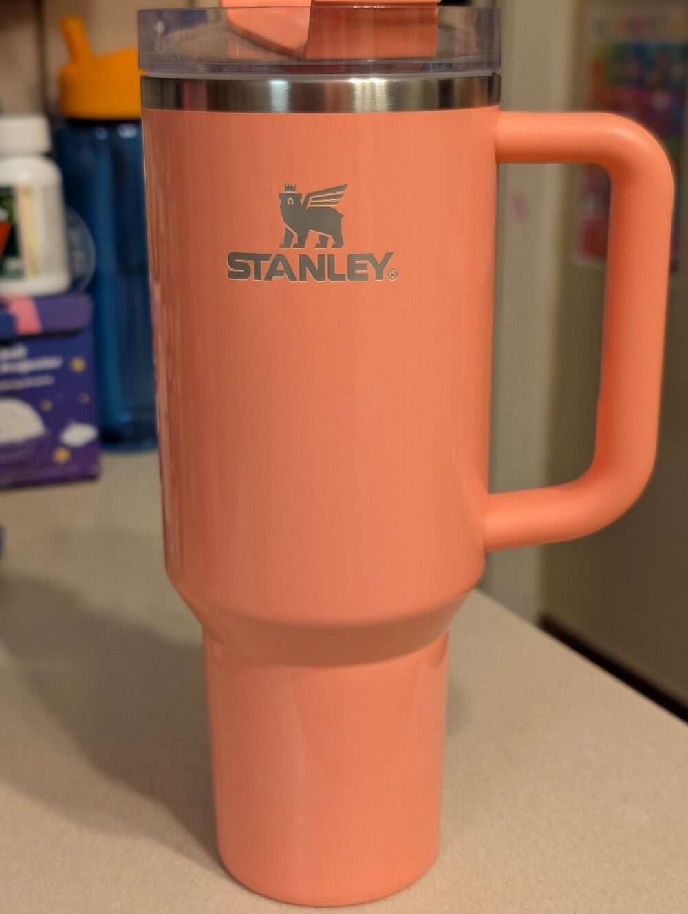 Stanley Coral-Orange Insulated Travel Mug with Handle